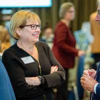 Donors standing and talking at Scholarship Dinner 2019